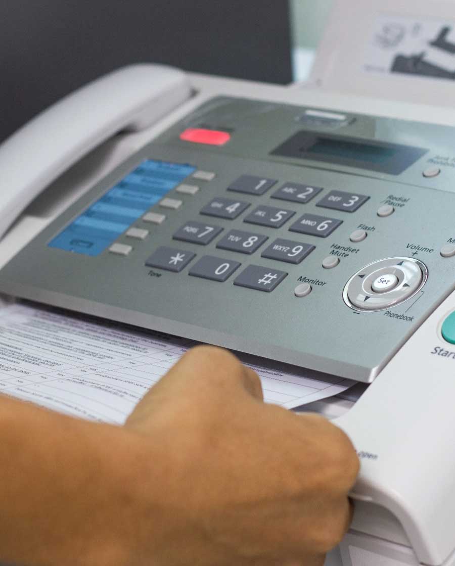 Fax machine sending a document